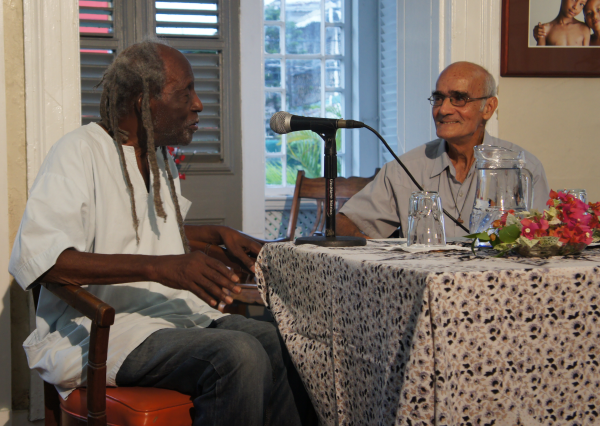 Brother Eusi Kwayana with Fr. Malcolm Rodrigues.